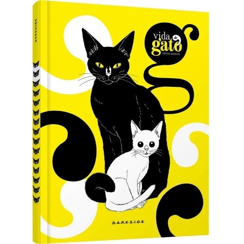 Livro amarelo com a imagem de dois gatos, sendo um preto e outro branco.