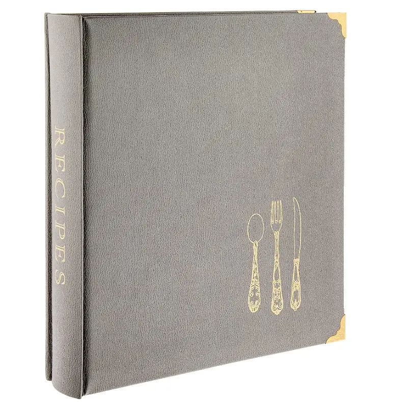 Capa de caderno de receitas na cor cinza com material rígido.